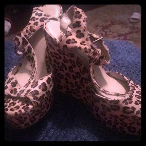 Lepord Print Size 11 Wedge Sandal.